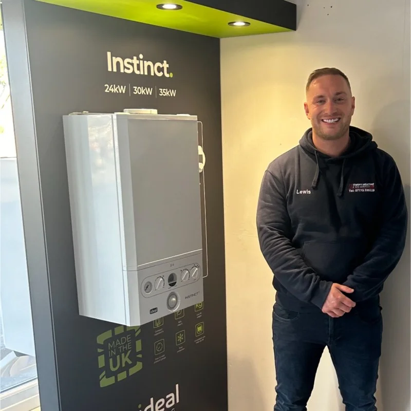 Lewis - Swift Heating engineer with boiler display